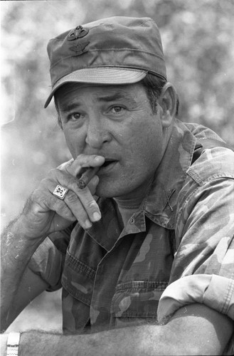 Portrait of Colonel John D. Waghelstein smoking a cigar at Ilopango Military Base, Ilopango, 1983