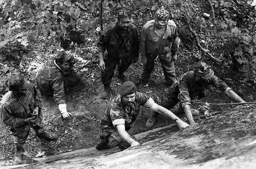 Survival school students learn to rock climb, Liberal, 1982