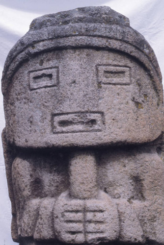 Stone statue with a mask-like face, San Agustín, Colombia, 1975