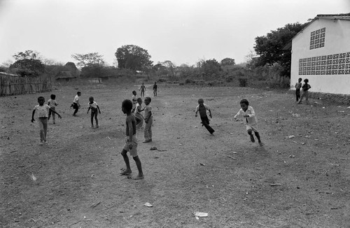 Boys playing in a dirt field, San Basilio de Palenque, 1977