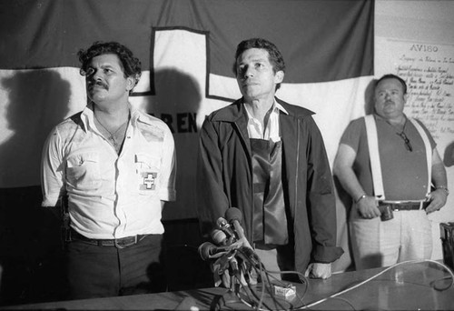 Roberto D'Aubuisson flanked by bodyguards, San Salvador, 1982