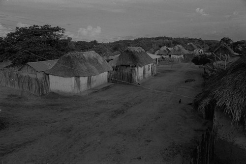 Electric poles standing in the street, San Basilio de Palenque, 1976