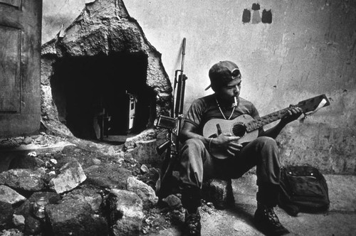 Sandinista plays the guitar, Nicaragua, 1979