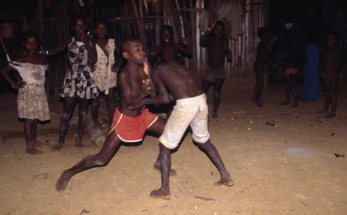 Boys boxing outdoors, San Basilio de Palenque, 1976