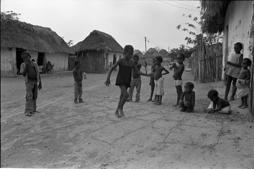 Children playing hopscotch on the street, San Basilio de Palenque, 1977