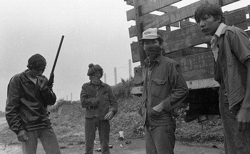 Sandinistas in the rain, Nicaragua, 1979