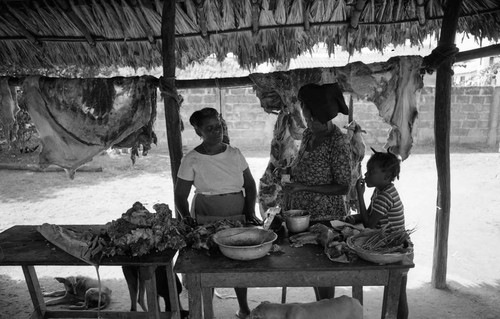 Women selling and buying meat, San Basilio de Palenque, 1976