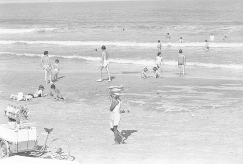 Woman selling fruit at the beach, Cartagena, ca. 1978