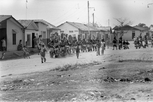 Dancers walking to the Carnival, Barranquilla, Colombia, 1977