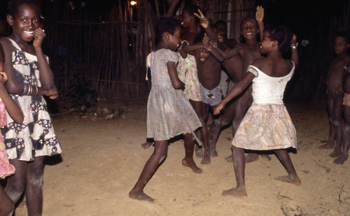 Girls boxing outdoors, San Basilio de Palenque, 1976