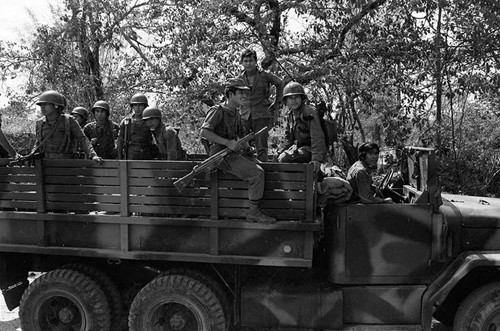 Army soldiers travelling on truck, Department of Cabañas, 1982