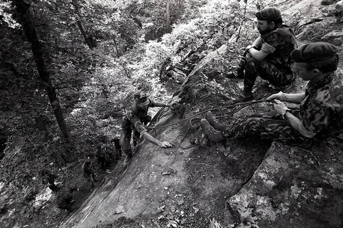 Survival school students learn to rock climb, Liberal, 1982