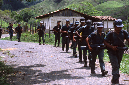 A group of Contra soldiers march in El Porvenir Farm, Nicaragua, 1983