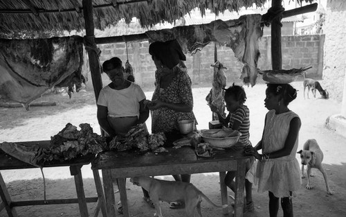 Women selling and buying meat, San Basilio de Palenque, 1976