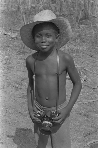 Boy with camera, San Basilio del Palenque, ca. 1978