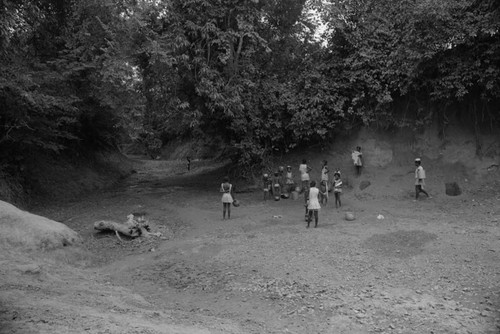 Women and girls collecting water at river, San Basilio de Palenque, 1976