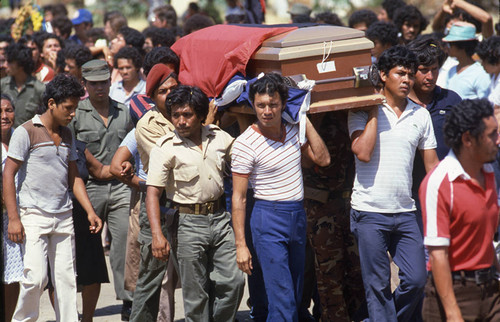 Carrying the coffin, Nicaragua, 1983