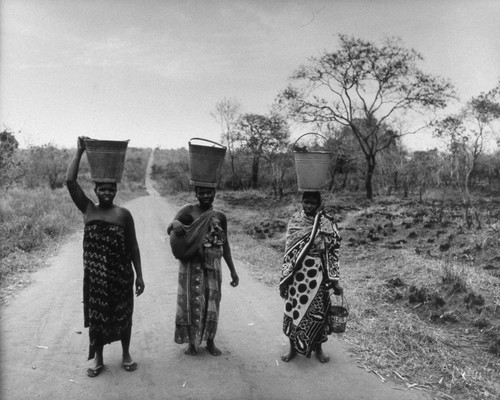 Maasai women carring containers, Tanzania, 1979