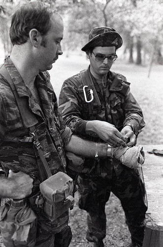 Survival school students learn first aid techniques, Liberal, 1985