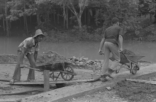 Two men working, Barbacoas, Colombia, 1979