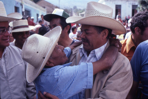 Presidential candidate Ángel Aníbal Guevara hugged during a campaign rally, Ciudad Vieja, 1982