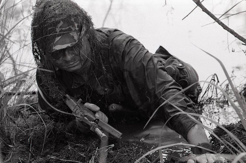 Survival school student practices silent swim techniques, Liberal, 1982