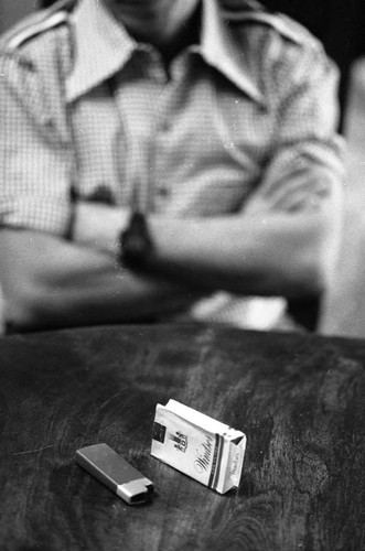 Portrait of Roberto D'Aubuisson's cigarette box and lighter, San Salvador, 1982