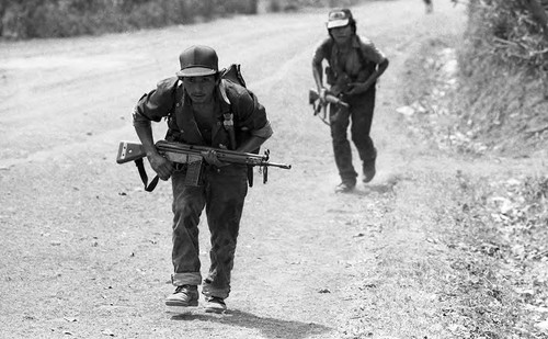 Guerrilleros advancing, Usulután, 1982