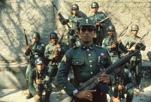 National guardsmen posing with rifles, Suchitoto, Cuscatlán, El Salvador, 1981