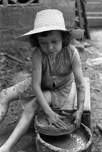 Artisan at work, La Chamba, Colombia, 1975