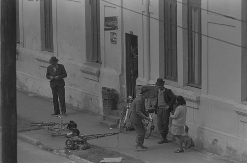 A group of men and women socializing, Bogotá, Colombia, 1976