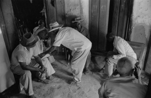 Men gather, San Basilio de Palenque, Colombia, 1977