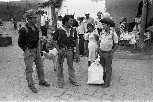 Guerrilleros speak with civilians, Corinto, Morazán, 1983