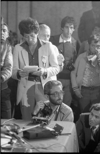 Journalists and photojournalists at a press conference against voter fraud, Guatemala, 1982