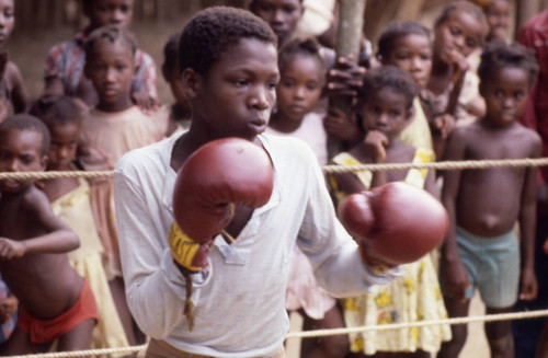 Boxer fighting inside ring, San Basilio de Palenque, 1976