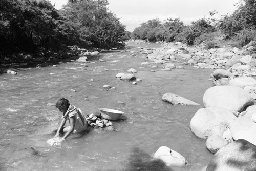 Woman washing in river, La Guajira, Colombia, 1976