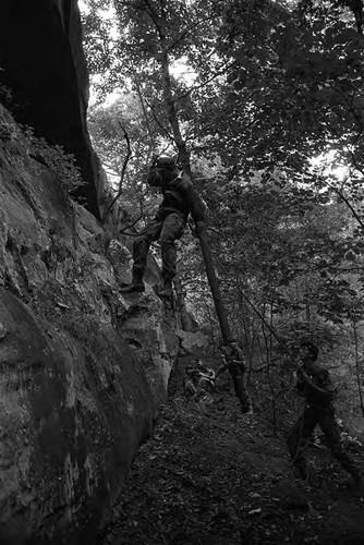 Survival school students learn to rappel, Liberal, 1982