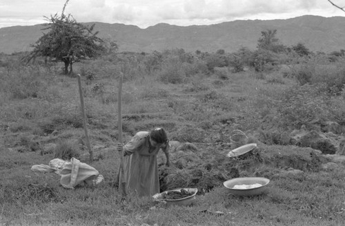 Woman extracting clay, La Chamba, Colombia, 1975