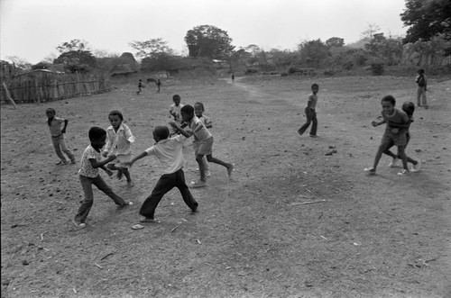 Boys playing in a dirt field, San Basilio de Palenque, 1977