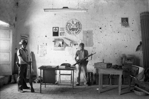 Two paramilitary men in the mayor's office, Alegría, Usulután, 1983