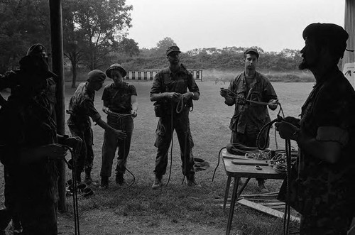 Claflin demonstrates rope tying, Liberal, 1982