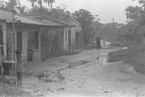 Child standing in the street, San Basilio de Palenque, 1976