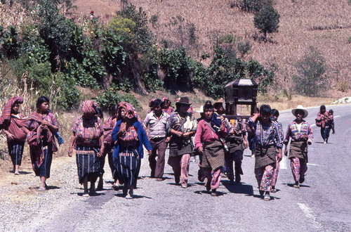 Mayan civilians carrying a coffin to the cemetery, Patzún, 1982