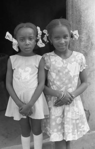 Two girls posing for a portrait, San Basilio de Palenque, 1976