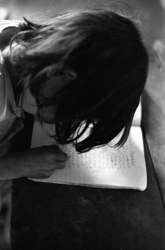 Young girl writing, La Chamba, Colombia, 1975