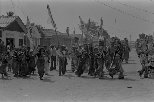 Dancers walking to the Carnival, Barranquilla, Colombia, 1977