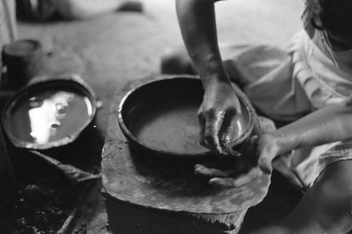 A woman making pottery, La Chamba, Colombia, 1975