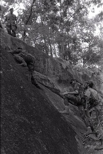 Survival school students learn to rock climb, Liberal, 1982