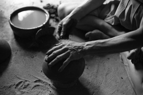 Artisan at work, La Chamba, Colombia, 1975