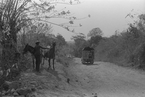 Pick up truck travelling on the road, San Basilio de Palenque, ca. 1978